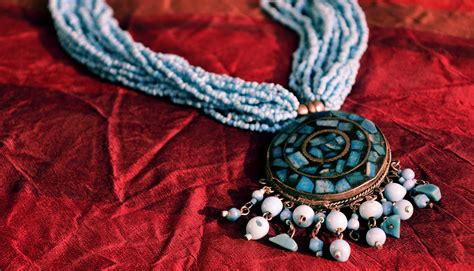 Exploring the Origins of Poe Turquoise Amulets: From Mines to Market